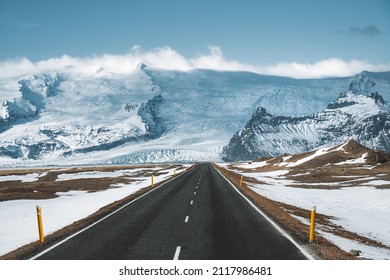 Street Highway Ring road No.1 in Iceland, with view towards massive glacier. Southern side if the country. Road trip travel concept.
