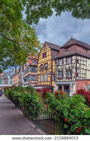 Street with historical houses in Colmar city center, Alsace, France