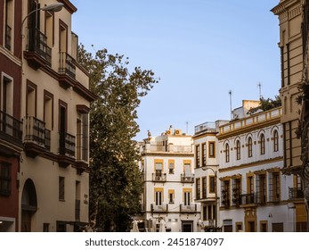 A street in the historical old town of Seville in Andalusia, Spain, no people, summer vacation, medieval buildings - Powered by Shutterstock