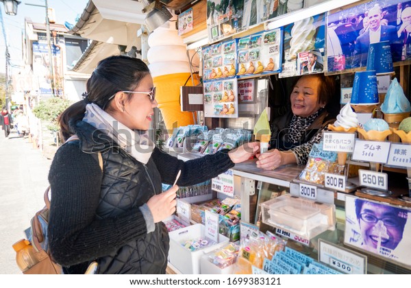 The street ice cream vendor in the Kamakura city\
where is an old capital city of  Japan. Kanagawa, Japan February\
11,2020