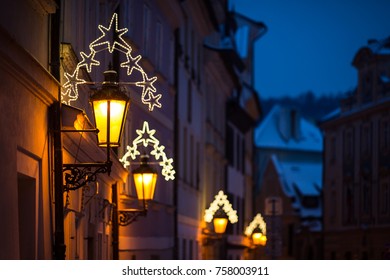 Street Lamp Decorated With Christmas Lights. Christmas Mood In The City.