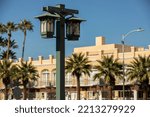 Street lamp framed view of downtown Chandler, Arizona, USA.