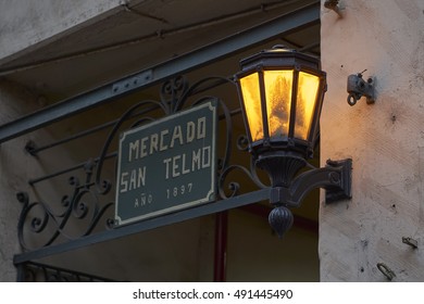 Street lamp at night on the wall of the old market in San Telmo, Buenos Aires, Argentina  - Powered by Shutterstock