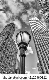 Street Lamp Post And Skyscrapers In New York City; Upward View; USA.