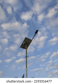 Street Lamp With Solar Panels On The Background Of A Clear Morning Sky