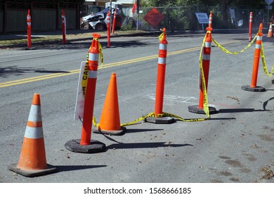 Street With Lanes Delimited By Road Separators. Roadworks. Organization Of Road Traffic Using Traffic Bollards. 