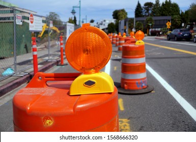 Street With Lanes Delimited By Road Separators. Roadworks. Organization Of Road Traffic Using Traffic Bollards. 