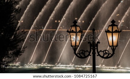 Street Lantern and Bellagio Fountains at Night