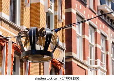 Street Light In The Shape Of A Crown, Celebrating A Festival, Above A Street In The Hague, Netherlands.