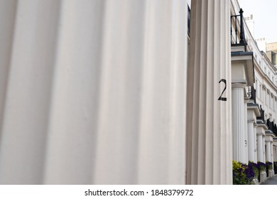 Street Of London With Numbers On A Greek Style Column