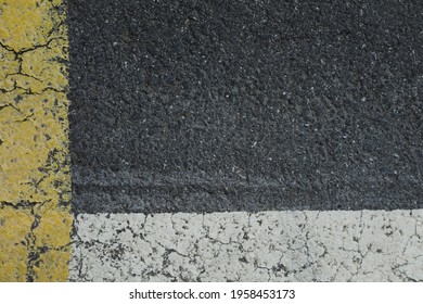 Street Marks With White And Yellow Colors And Lines And Corner, No Person And Space For Text And Background