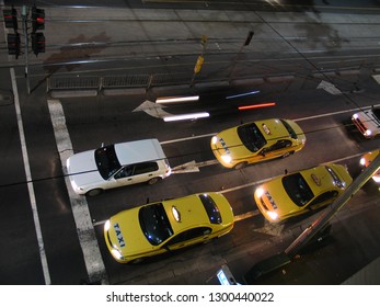 Street In Melbourne With Cars At Night. Australia