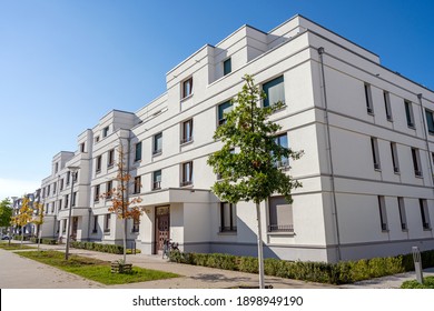 Street With Modern White Townhouses In Berlin, Germany