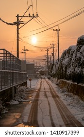 A street in the morning with snow
