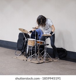 Street Musician Drummer Playing In Underground Subway