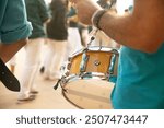 Street musician playing traditional human towers music in a parade. Catalan music instruments.