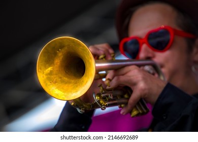 Street Musician Playing The Trumpet