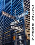 street name signs at Broadway and Maiden Lane in Manhattan, NYC