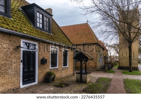 Street with old Dutch commander houses in the town of Ballum on the West-Frisian island Ameland, Netherlands Stock photo © 