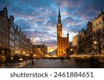 Street in an Old town and Town Hall in Gdansk, Poland. Panoramic evening view, long exposure, timelapse.  Historical city of Gdansk (Danzig) , Poland, Europe.