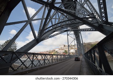 Street on lower floor of the Ponte Luiz I Bridge in Porto, Portugal.
