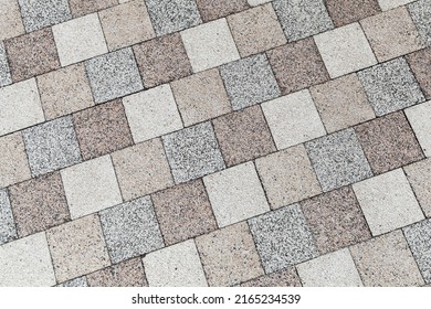 Street pavement background photo texture, square colorful stone blocks
