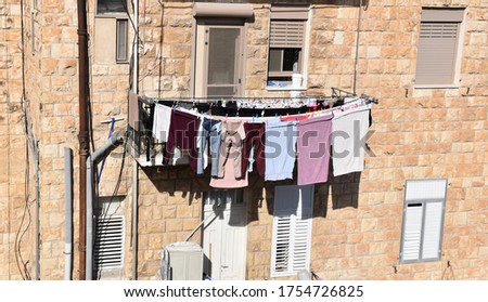 Street photo of residence and laundry