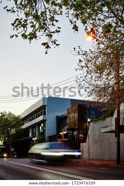 Street photography of Albany Street\
at dawn in the suburb of Crows Nest,  Sydney NSW Australia\
