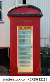 Street Photography Of A Vintage Red Public Phone Box In Rural Queensland Australia