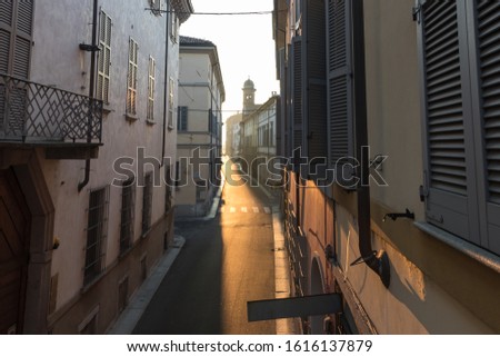 A street in Piacenza (Italy) during sunrise