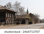 Street of a provincial Siberian city. View of old wooden houses and mosque. Tatarskaya street, Tomsk city, Tomsk region, Siberia, Russia.