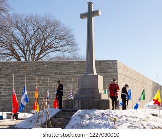 
Grande-Allée Street, Quebec City, Quebec, Canada, November 11, 2018 - Royal 22nd Regiment, Royal Canadian Mounted Police And Naval Reserve Men Standing Guard At The Cross Of Sacrifice