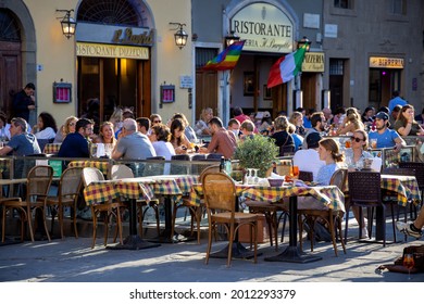 Street Restaurant In Square Full Of People With Italy And Rainbow Flags To Celebrate Football Victory. Post Covid Irally, Slow Reopening After Coronavirus Quarantine. Florence, Italy 2021.07.18