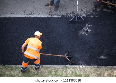 Street Resurfacing. Fresh Asphalt Construction. Bad Road