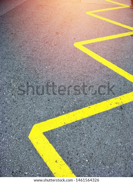 street road\
with yellow zigzag paint line\
symbol