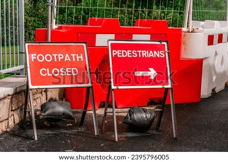 Street Roadworks Safety Barrier with Pedestrians Forbidden Closed Walkway Sign