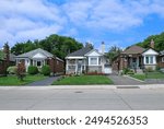Street with row of small bungalow type houses