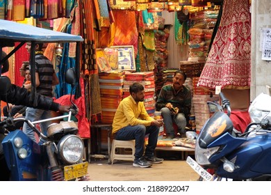 Street Seller Man In India, Daily Life, Fabric Shop Owner In India, Colorful Traditional Indian Fabrics, Indian Style New Delhi, India, March 2019.