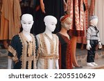 Street Shop. Barta’a. Israel. Traditional Women Dresses on mannequins on the street. Israel