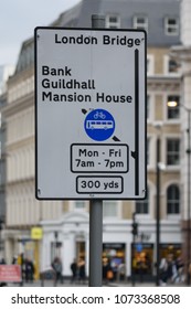 A Street Sign In Central London Directs Traffic Towards Bank, Guildhall, Mansion House And London Bridge.