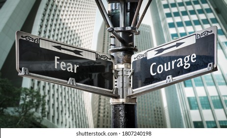 Street Sign the Direction Way to Courage versus Fear