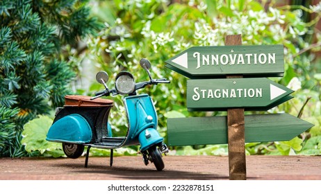 Street Sign the Direction Way to Innovation versus Stagnation - Shutterstock ID 2232878151