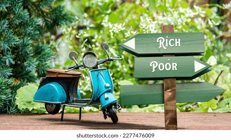 Street Sign the Direction Way to Rich versus Poor - Shutterstock ID 2277476009