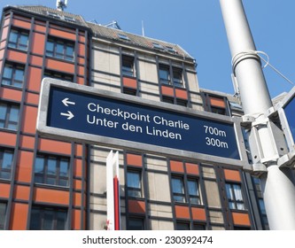 street sign in the famous Friedrichstrasse in Berlin with some wellknown landmarks on it