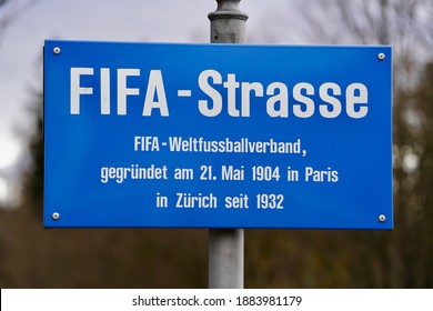 Street sign FIFA-Street at FIFA headquarters. Translation World Football Association, founded May 21st, 1904, at Paris,  in Zurich since 1932.