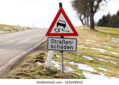 Street Sign In Germany Warning Slippery Road (water, Ice, Snow, Oil Or Dirt) - Text Translation 