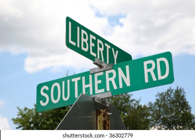 Street sign showing the symbolism between life in the south (USA) and the pursuit of liberty.