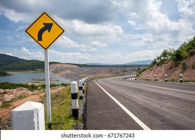 The Street Sign Turn Right On The Mountain Road