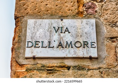 Street sign for Via dell'Amore (Love Street), iconic street in the city centre of Pienza, Italy