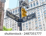 street sign Wall Street corner Broadway